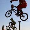 A couple of young bikers take to the air on Sunday at the Lemoore BMX Raceway.